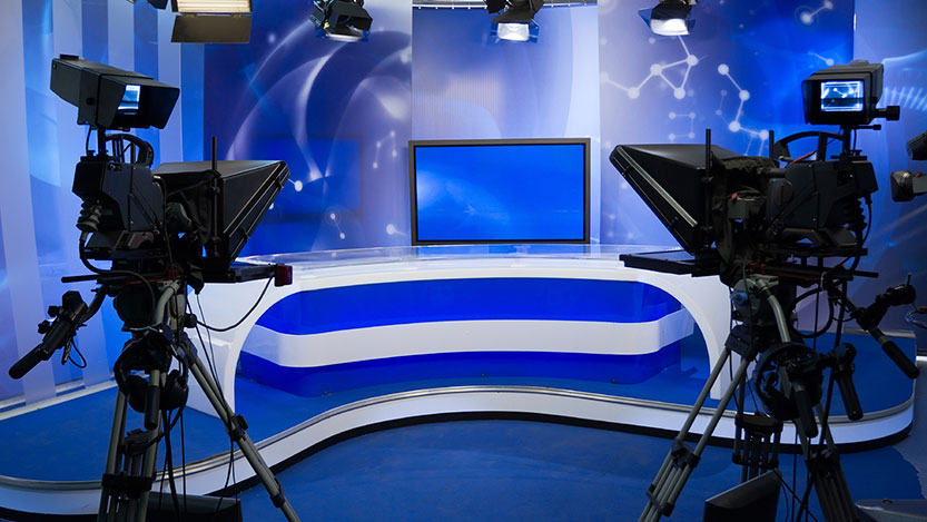 TV studio with camera and lights